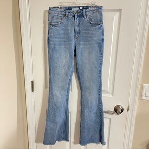 A loves a High Waist flare jeans with raw hem size 27